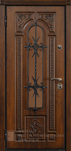 Фото «Дверь с ковкой №7»  в Аперелевке