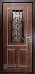 Фото «Дверь с ковкой №20»  в Аперелевке
