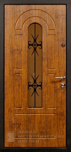 Фото «Дверь с ковкой №12»  в Аперелевке