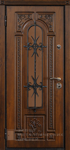 Фото «Дверь с ковкой №7»  в Аперелевке