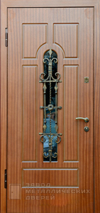 Фото «Дверь с ковкой №19»  в Аперелевке